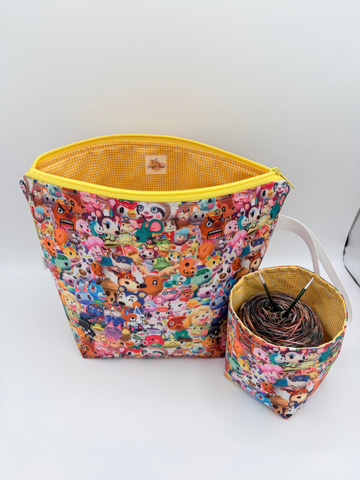 Villager Friends Crowd Knitting and Crochet Zipper Style Project Bag + Yarn Cozy | XL Sock Size